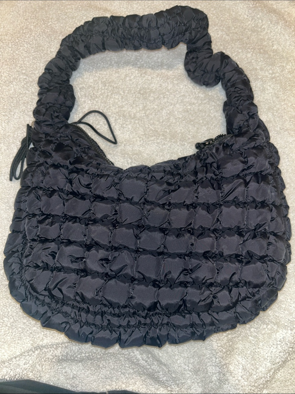 Black bubble style purse.
